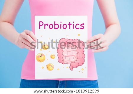 woman take probiotics billboard on the blue background