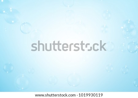 Bright blue bubbles floating background