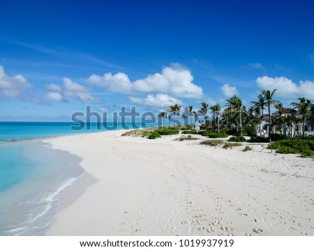 Drone photo of pier in Grace Bay, Providenciales, Turks and Caic Royalty-Free Stock Photo #1019937919