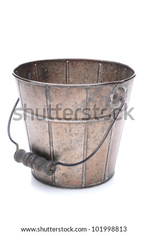 An empty old fashioned bucket over a white background. Royalty-Free Stock Photo #101998813