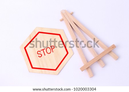 STOP writing on small wood board isolated on white background