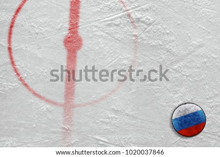 Fragment of the hockey arena with the central circle and the Russian washer. Concept, hockey