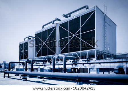 Sets of cooling towers in data center building. Royalty-Free Stock Photo #1020042415