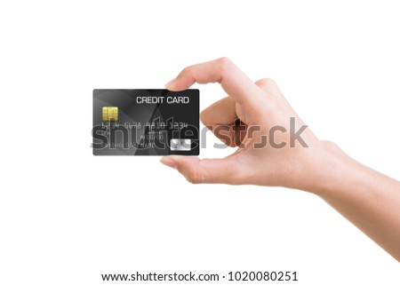 Female hand holding a bank credit card isolated on white background