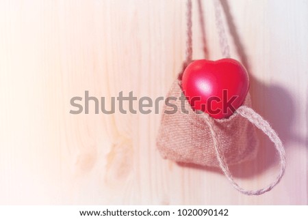 Soft style with Red Heart in Hemp bag on Wood wall vintage for Valentine's Day   Background