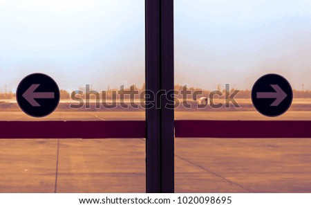Sliding glass doors to the runway