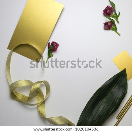 Set of gold paper cards with decor elements, top view