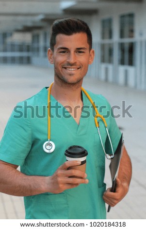 Health care worker in hospital entrance