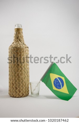 Cachaca bottle brazilian liquor and flag