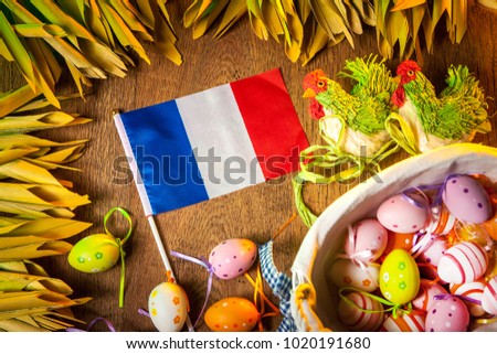 Easter Festival in France. Easter eggs. Religious holidays in France. Flag of Frinthia. Easter decorations.