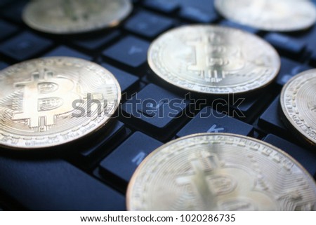 Gold Bitcoins On Computer Keyboard 