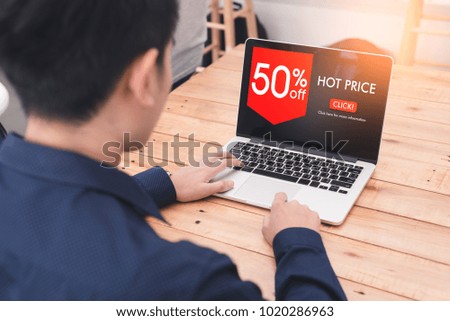 The abstract image of businessman using the laptop computer for online shopping. The concept of online shopping, online payment, financial and internet of things