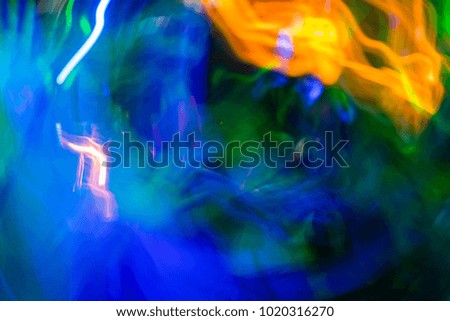 colourful lights of night life people