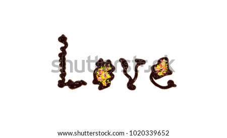 The word love written by chocolate isolated on white background. Do not forget to tell someone you love in this valentine day.