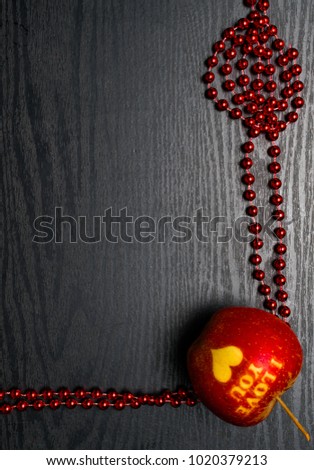 sweet apples writining i love you with red beads