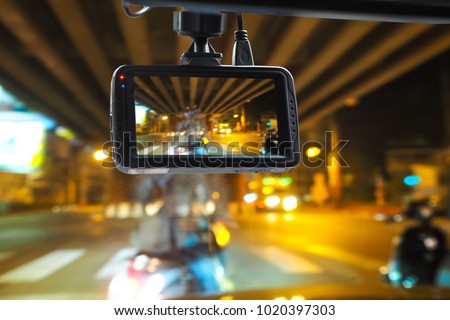 CCTV car camera for safety on the road accident on abstract blurred bogey light of city in night background. Royalty-Free Stock Photo #1020397303