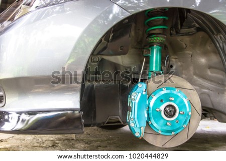 Caliper Brake with disk and suspension in the car service concept and racing part