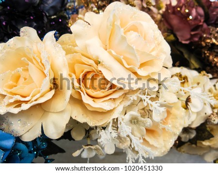 luxurious Artificial Roses Flowers with glitter on selling in a flower shop for home decoration. Flower Shop. Valentines Day. 