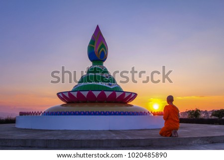monk pay homage to stupa pagoda wat ban khun