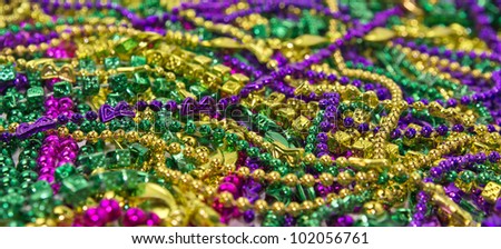 Backgroun of colorful Mardi Gras beads