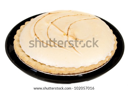 Lemon meringue pie isolated on the white. Studio shoot.