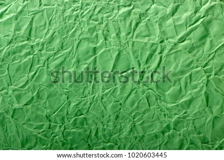 Green crepe Wrinkled Paper Texture background abstract