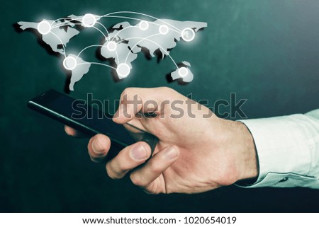 Businessman interacting with a virtual world map