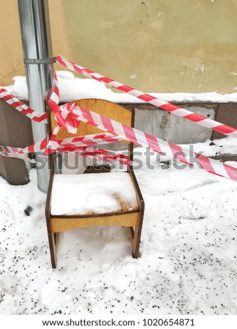 Winter danger snow icicles slippery chair
