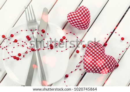Heart and fork on plate