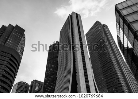 tall building, business tower at downtown, City center, bussness area between evening to twilight night, Tokyo, capital city of Japan