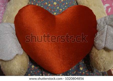 Red heart shape pillow in the living room