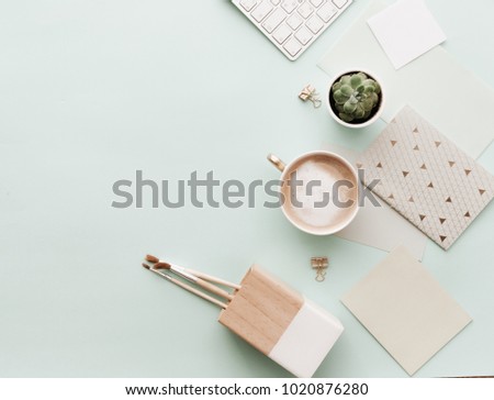 Minimalist Flat Lay Hipster Desktop With Coffee Latte and Supplies 