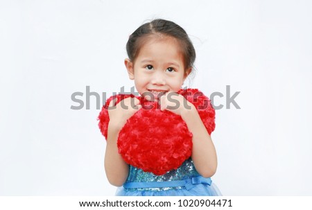 Happy Asian child girl with heart Valentine's Day isolated on white background.