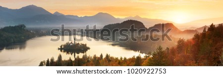 Amazing View in autumn  : Bled Lake, Island,Church And Castle With Mountain Range (Stol, Vrtaca, Begunjscica) In The Background-Bled,Slovenia,Europe