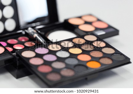 Backgrounds of Cosmetic makeup set on table.