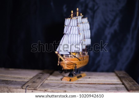ship souvenir, ship mast close-up on a black background