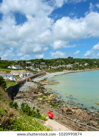 Early summer afternoon sunshine on old fashioned Coverack village in the Lizard Peninsula, Cornwall, UK