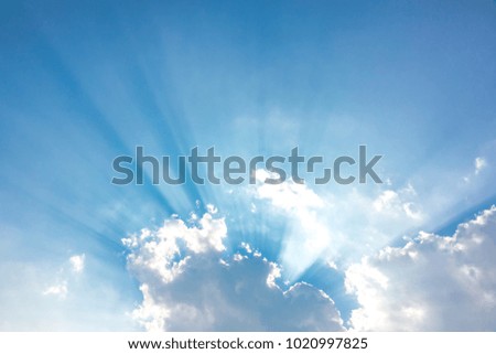 Light sun on sky blue or azure sky and cloud. The sky or celestial dome is everything that lies above the surface of the Earth. In meteorology or cloud is an aerosol comprising a visible mass.