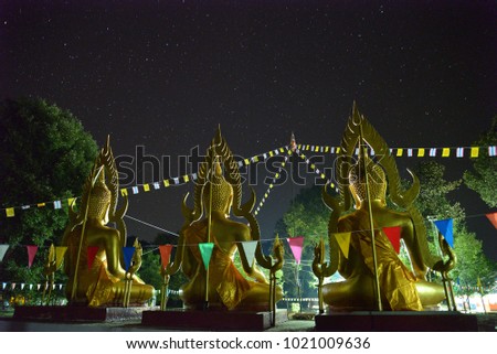 The back of the Buddha with star in night sky background