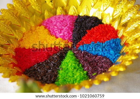jasmine rice colorful in the golden pan for the ceremony