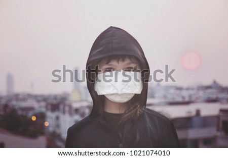 The portrait of girls with mask, city background
