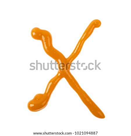 Single latin letter X made of food sauce isolated over the white background