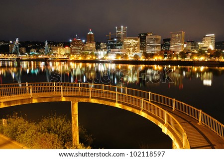 circular walkway and city view in night time