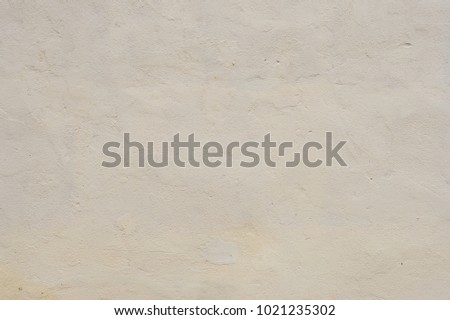 Texture Beige dyed cemented wall, softly lined. Exterior texture exterior wall of external walls