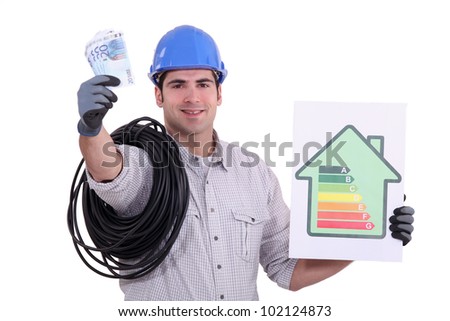 an electrician showing an energy class chart