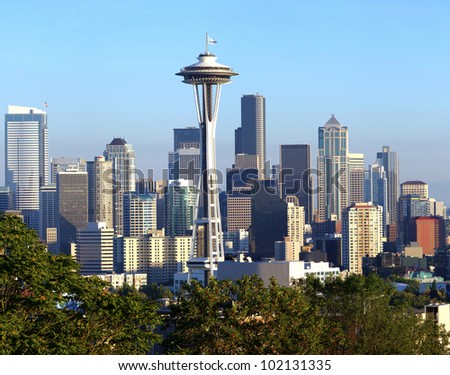 A view of Seattle Washington modern skyline buildings and mt. Rainier.