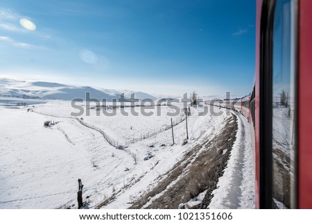 Train through the winter landscapes