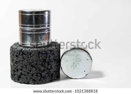 Asphalt sample or specimen with weight on it, representing bearing capacity test for civil engineering second image Royalty-Free Stock Photo #1021388818