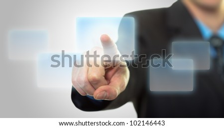 Businessman hand pushing the virtual button as concept