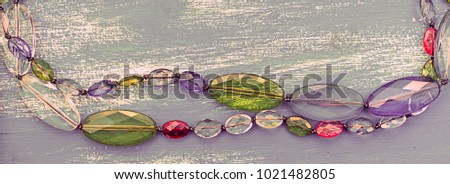 Banner Decorative background for text. Empty picture frame jewelry on a painted wooden background. Top view Flat lay
